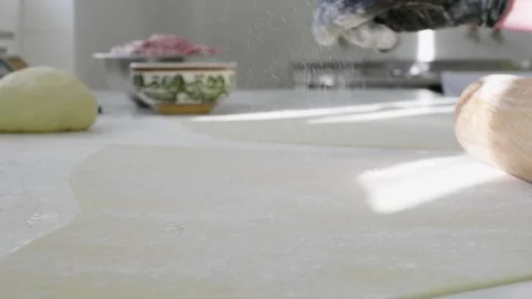 Baker working with dough to prepare buns and bread Stock Footage 280584112