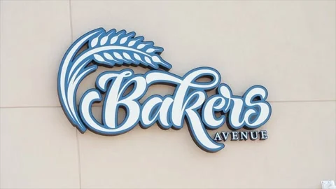 Bakers avenue writing caption text illustrated animated sign on light beige wall Stock Footage 249756950