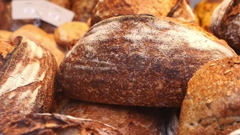 Bakers display different bread types at local market Stock Footage 342691531