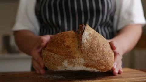 Baker’s Hand Presenting Sourdough. Stock Footage 308233209
