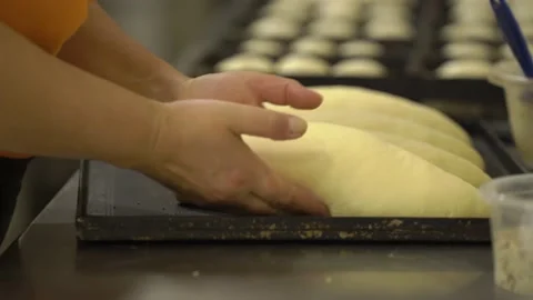 Baker's hands make bread․ Baking bakery Bread industry. Stock Footage