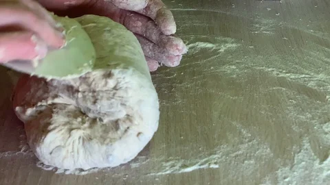 The Baker's hands. Process the dough for wheat bread with seeds. Female Video stock 124954107