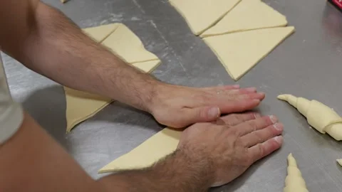 Baker's Hands Rolling Croissant Triangles Overhead View Stock Footage 336394894