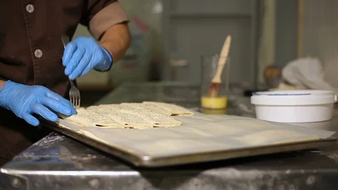 The Baker's hands at work in the kitchen Stock-Footage 106480909