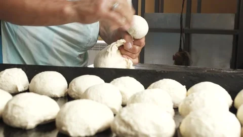 Bakers make rolls from dough Stock Footage 133089900