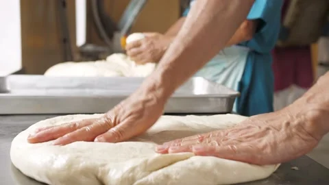 Bakers make rolls from dough Stock Footage 133090298