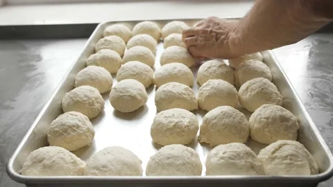 Bakers make rolls from dough Stock Footage 133090788