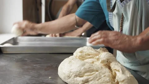 Bakers make rolls from dough Stock Footage 133109650
