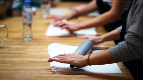 The Bakers makes biscuits with a rolling pin. close up Video stock 72256803