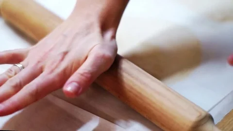 The Bakers makes biscuits with a rolling pin. close up Video stock 72256905