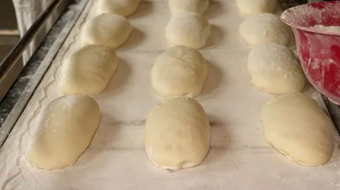 Bakers prepares bread. Kitchen of the bakery. Stock Footage 64471044