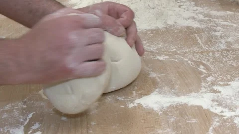 Bakers Shaping Bread Dough by Hand on Floured Table Vídeo Stock 346472810