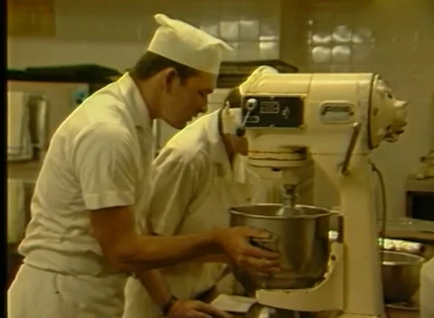 BAKERS WORKING IN A BAKERY / KITCHEN (1986) Stock Footage 162869371