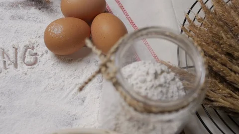 Bakery Accessories Background with baking text writing on flour. Stock Footage 95654565