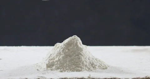 Bakery and cooking concept. Fresh bread with a splash falls into flour 스톡 동영상 126501874