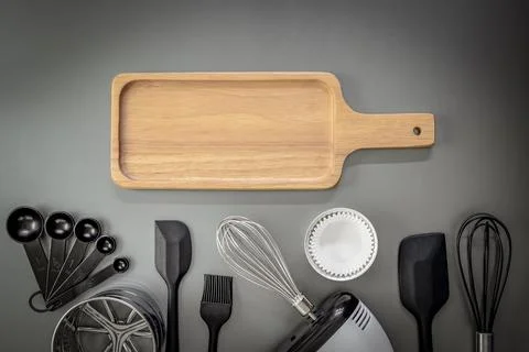 Bakery background. Bread cutting board, Measuring spoon, Stainless steel flou Stock Photos