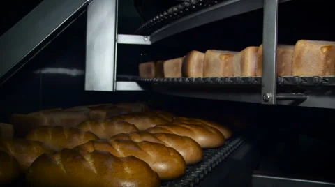 Bakery. Baked Different Tupes of Bread Moving on Coveyers on 2 Levels. Fresh Stockbeeldmateriaal 68622737