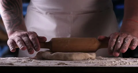 Bakery, a baker blows off flour Stock Footage 107901784