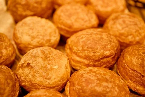 Bakery. Batch of fresh textured buns. Stock Photos