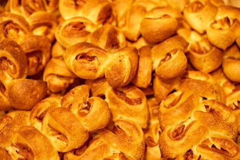 Bakery. Batch of fresh textured buns. Stock Photos