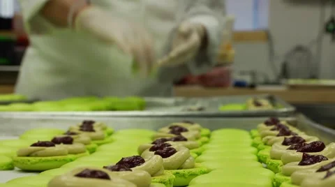 Bakery Chef assembling Macaroon cookies low angle Stock-Footage 50804071