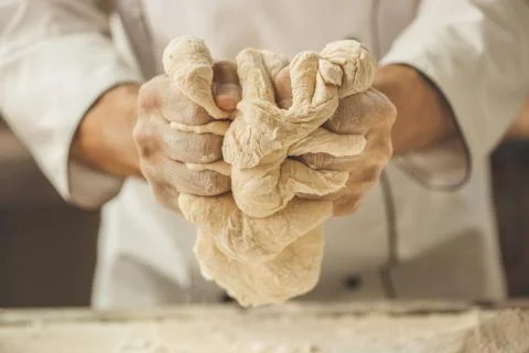 Bakery chef cooking bake in the kitchen professional Stock Photos