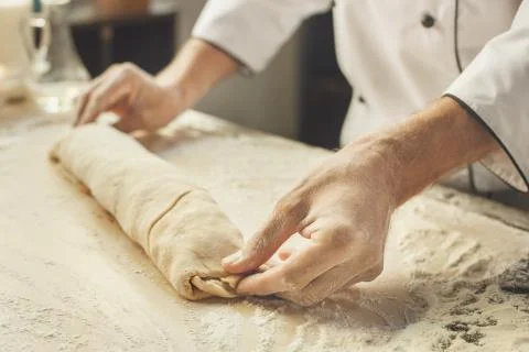 Bakery chef cooking bake in the kitchen professional Foto stock