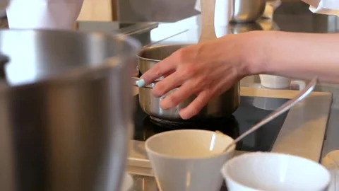 Bakery chef hands Making dessert in modern kitchen. Stock Footage 142112253
