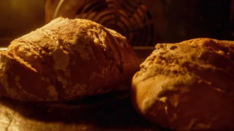 Bakery concept. Homemade bread baking in oven. Organic fresh bread. Stock Footage 247434125