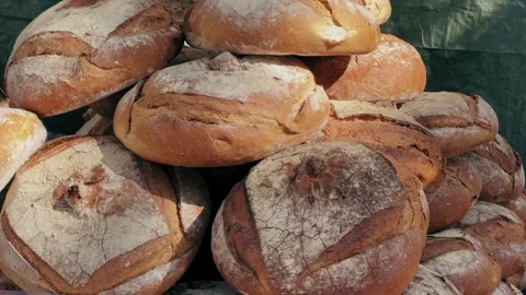 Bakery concept. Homemade bread on showcase at the food market. Organic fresh Stock-Footage 277105361