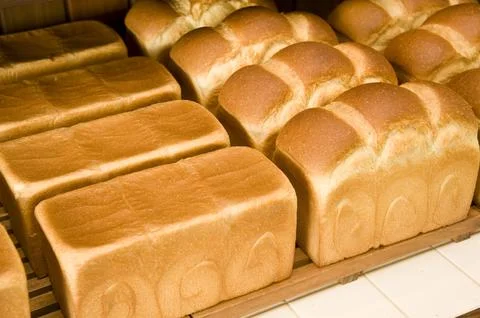 Bakery concept. Plenty of sliced bread background Foto stock