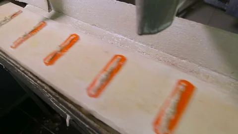 Bakery. Conveyor for the production of bread. Stock Footage 74593267