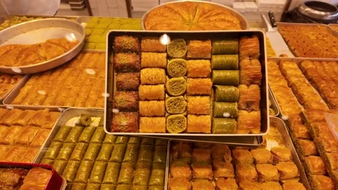 Bakery display of traditional sweets in local shop Stock Footage 341456965