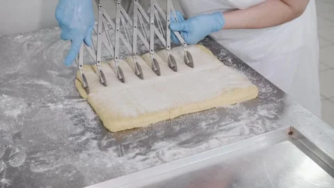 Bakery Dough Cutting Process. Bakery production. Video stock 321544863