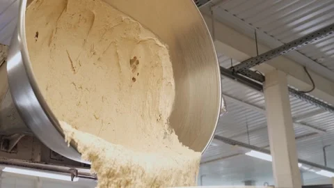 Bakery Dough Processing on Industrial Production Line Stock Footage 340194369