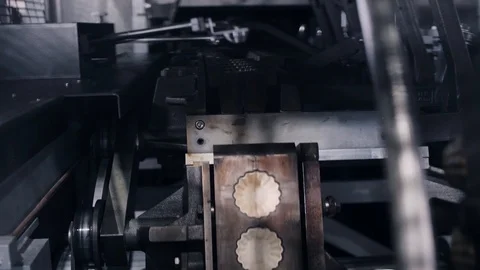 Bakery equipment with split dies and press mould for baking Stock Footage 124892541
