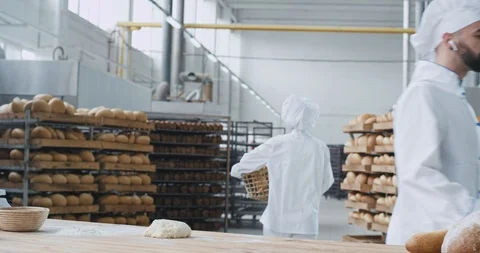 Bakery factory enthusiastic dancing baker chef while preparing the dough for Stock Footage 112137092
