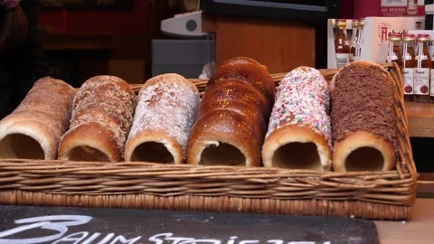 Bakery items layout showcase on a pedestrian touristic street closeup Stock Footage 296818190