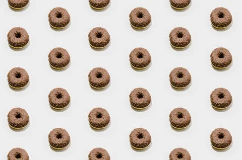 Bakery pattern with chocolate donuts Foto stock