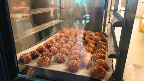 The bakery production process at the confectionery. Ready-made croissants on the Stock Footage 323820005