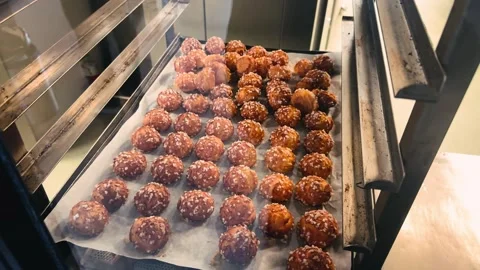The bakery production process at the confectionery. Ready-made croissants on the Stock Footage 328286823