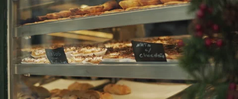 Bakery shop window display Stock Footage 152582914