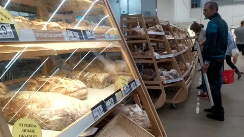 Bakery. showcases with bread and rolls Video stock 137656462