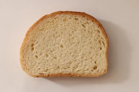 Bakery slice background. Bread crumb texture. Stock Photos