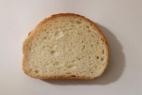 Bakery slice background. Bread crumb texture. Stock Photos