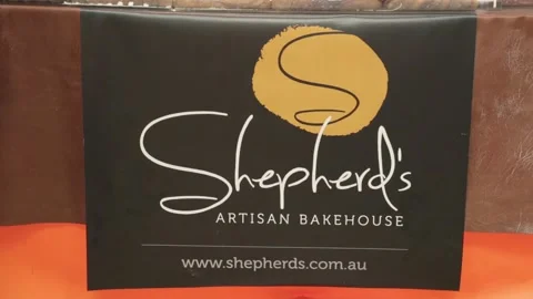 Bakery Stall Sign Displayed at Sydney Market Event, Close-Up Branding View Stock Footage 345801728