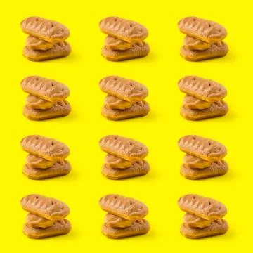 Bakery sweet pastry stack pattern on yellow Stock Photos