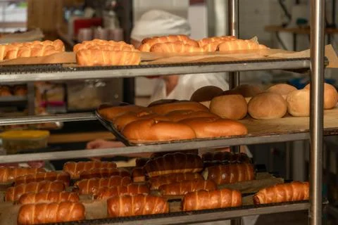 Bakery with various types of pastries, bread and rolls Stock Photos