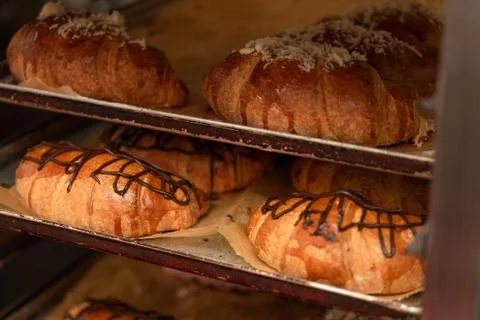 Bakery with various types of pastries, bread and rolls and croissants Stock Photos