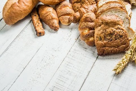 Bakery on wood white background different types of bread Stock Photos
